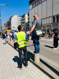 People on street in city