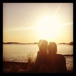 Silhouette of woman at sunset