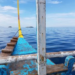 Close-up of blue sea against sky