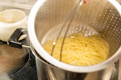 High angle view of soup in cooking pan on table