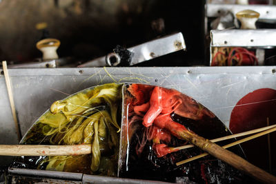 High angle view of food on barbecue grill