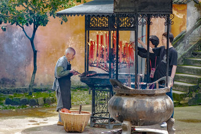 Man standing in traditional clothing