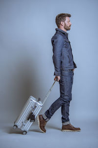 Man standing against white background