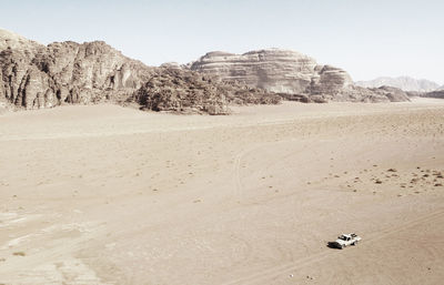 Scenic view of desert against clear sky