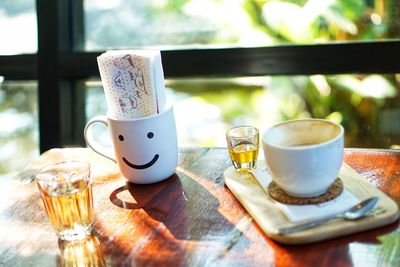 Close-up of coffee cup on table