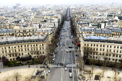 High angle view of cars on street in city