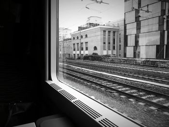 Railroad tracks seen through train window