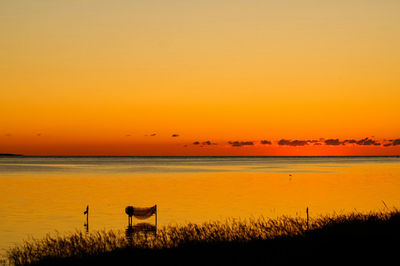 Scenic view of sea at sunset