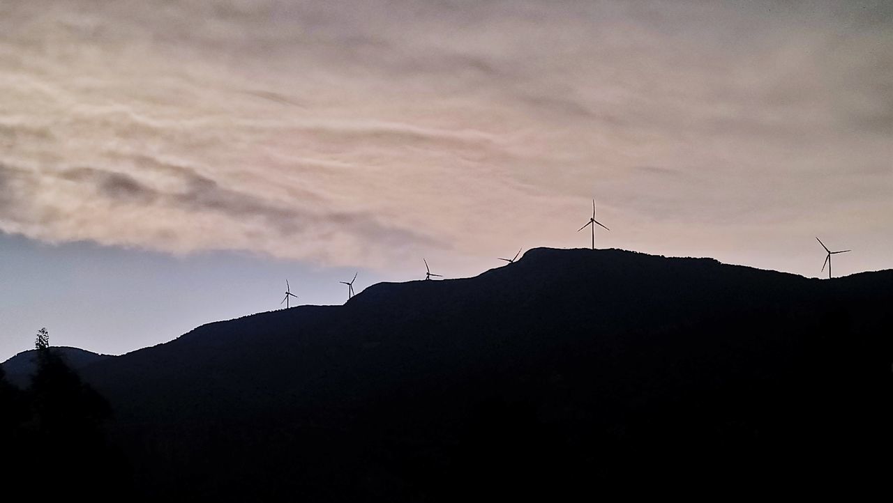 sky, cloud - sky, mountain, environment, wind turbine, turbine, beauty in nature, environmental conservation, scenics - nature, fuel and power generation, silhouette, sunset, renewable energy, wind power, alternative energy, nature, tranquil scene, tranquility, landscape, no people, outdoors, sustainable resources