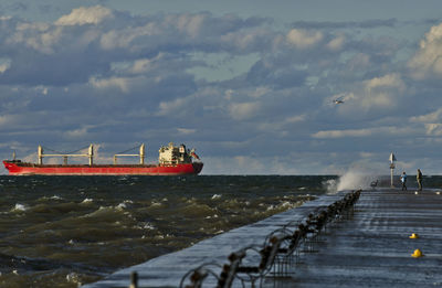 Pier over sea against sky