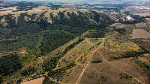 High angle view of road passing through land