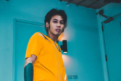 Portrait of young woman using mobile phone