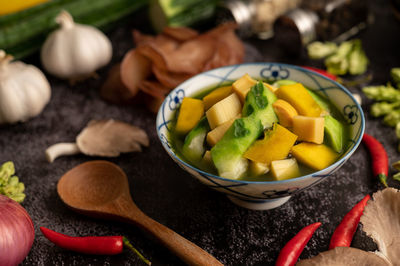 Close-up of chopped vegetables in bowl on table