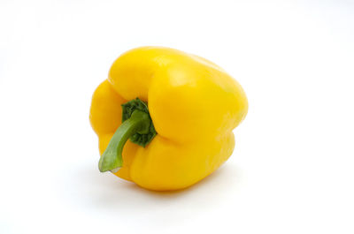 Close-up of yellow bell pepper against white background