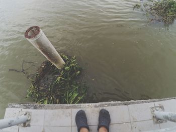 Low section of person in lake