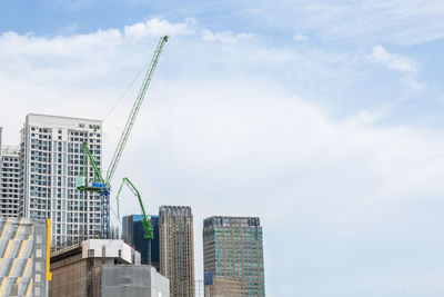 Low angle view of modern buildings against sky