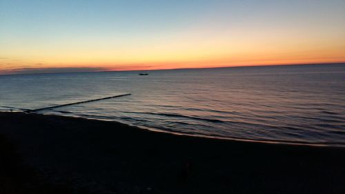 Scenic view of sunset over sea