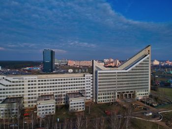 High angle view of buildings in city against sky