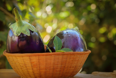 Close-up of fruits in basket on table