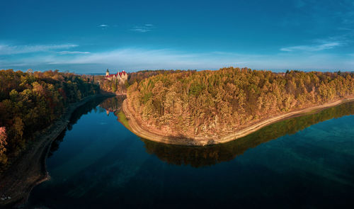 Scenic view of lake against blue sky