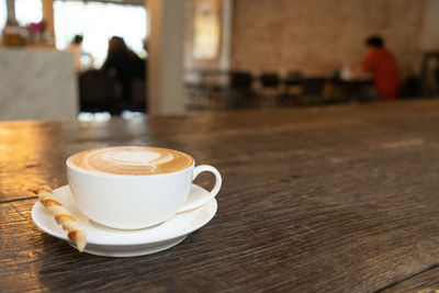 Close-up of coffee on table at cafe