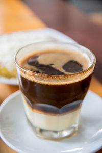 Close-up of coffee cup on table