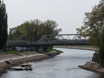 Bridge over river against clear sky