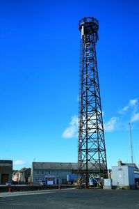 Low angle view of tower against clear blue sky