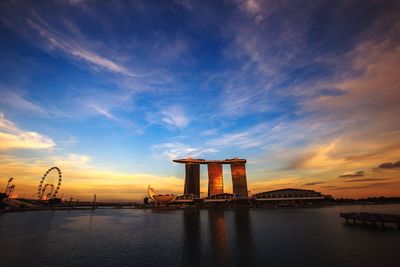 Marina bay sands against sky during sunset