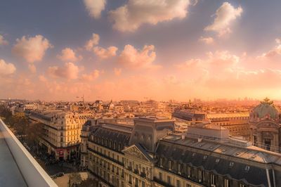 High angle view of buildings against sky during sunset