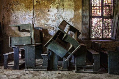 Old chairs in abandoned church
