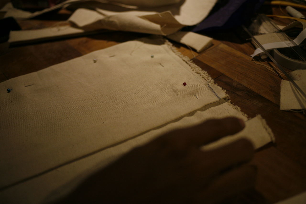 CLOSE-UP OF PAPER ON TABLE