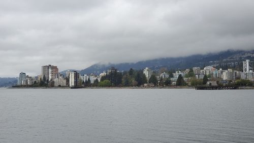 City by buildings against sky