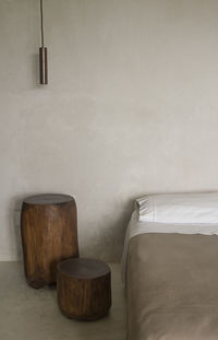 Empty chair against wall at home