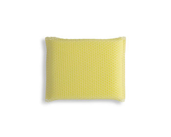 Close-up of yellow paper over white background