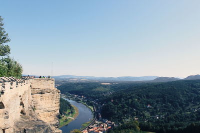 Scenic view of mountains against clear blue sky