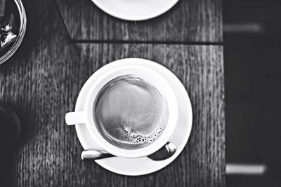 Directly above shot of coffee cup on table