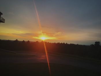 Silhouette landscape against sky during sunset