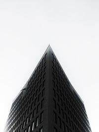 Low angle view of modern building against clear sky