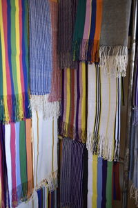 Multi colored flags hanging at market stall