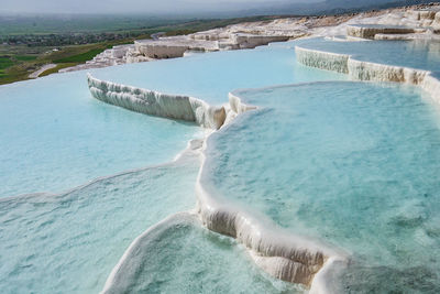 Panoramic view of blue sea against sky