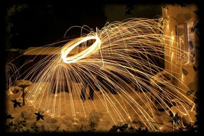 Low angle view of firework display