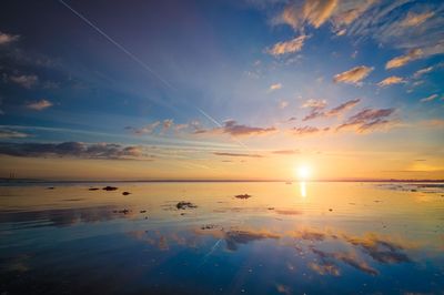 Scenic view of sea at sunset