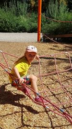 High angle view of girl playing on grass