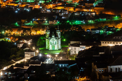 High angle view of buildings at night