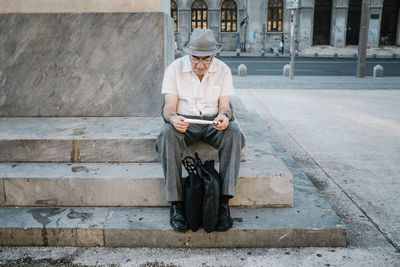 Woman looking at city street