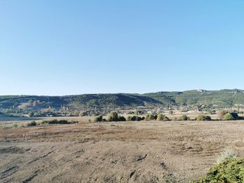 Scenic view of landscape against clear sky