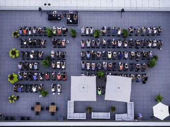 Directly above shot of people exercising in building