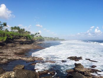 Scenic view of sea against blue sky