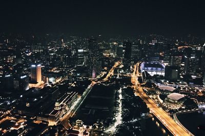 High angle view of illuminated cityscape at night